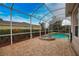 Enjoy this relaxing screened pool and spa area at 4940 Thames Ln, Sarasota, FL 34238