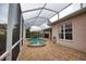 Relaxing screened pool and spa with brick pavers at 4940 Thames Ln, Sarasota, FL 34238