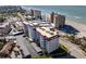Oceanfront property aerial view, showing building and parking at 500 The Esplanade N # 306, Venice, FL 34285