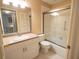Bathroom with shower/tub combo, toilet and white vanity at 500 The Esplanade N # 306, Venice, FL 34285