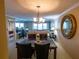 Dining room with table and chairs, ocean view at 500 The Esplanade N # 306, Venice, FL 34285