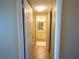 Hallway with access to bathroom and bedroom at 500 The Esplanade N # 306, Venice, FL 34285