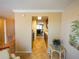 Hallway view showing kitchen and dining area at 500 The Esplanade N # 306, Venice, FL 34285