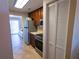 Kitchen with stainless steel appliances and wood cabinets at 500 The Esplanade N # 306, Venice, FL 34285