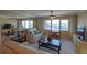 Living room with ocean view and comfy seating at 500 The Esplanade N # 306, Venice, FL 34285