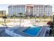 Communal swimming pool with surrounding lounge area at 500 The Esplanade N # 306, Venice, FL 34285