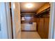 Spacious walk-in closet with shelving and dresser at 500 The Esplanade N # 306, Venice, FL 34285
