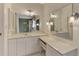 Clean bathroom with double vanity and large mirror at 519 Rubens Dr # 519, Nokomis, FL 34275