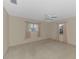 Spacious bedroom with neutral carpeting and ceiling fan at 519 Rubens Dr # 519, Nokomis, FL 34275