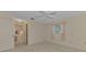 Bright bedroom with ceiling fan and ensuite bathroom at 519 Rubens Dr # 519, Nokomis, FL 34275