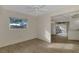Bright dining room with view to patio and kitchen at 519 Rubens Dr # 519, Nokomis, FL 34275