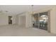 Bright dining room with patio access and neutral colored floors at 519 Rubens Dr # 519, Nokomis, FL 34275