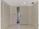 Bright entryway with tiled floor and built-in closets at 519 Rubens Dr # 519, Nokomis, FL 34275