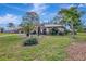 House exterior view, showing landscaping and driveway at 519 Rubens Dr # 519, Nokomis, FL 34275