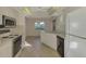 Clean kitchen with stainless steel appliances and light cabinets at 519 Rubens Dr # 519, Nokomis, FL 34275