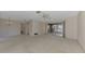 Living room and dining area with access to a screened lanai at 519 Rubens Dr # 519, Nokomis, FL 34275