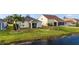 Property view from above showcasing backyard and pond at 5217 Layton Dr, Venice, FL 34293