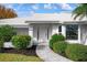 Front entry with walkway leading to the front door at 545 Warwick Ln, Venice, FL 34293