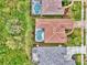 Bird's-eye view of a luxury home and pool at 5561 White Ibis Dr, North Port, FL 34287
