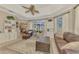 Bright Gathering room with built-in shelving and pool view at 5561 White Ibis Dr, North Port, FL 34287
