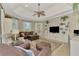 Spacious Gathering room with built-in shelving and pool access at 5561 White Ibis Dr, North Port, FL 34287