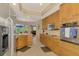 Bright kitchen with stainless steel appliances and granite countertops at 5561 White Ibis Dr, North Port, FL 34287