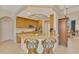 Spacious kitchen with granite countertops, island, and stainless steel appliances at 5561 White Ibis Dr, North Port, FL 34287