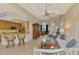 Open floor plan with kitchen island and living room at 5561 White Ibis Dr, North Port, FL 34287