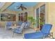 Relaxing patio with seating area, providing an outdoor space for entertaining at 5561 White Ibis Dr, North Port, FL 34287
