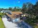 Aerial view of single-Gathering home, yard, and neighborhood at 609 Constance Rd, Venice, FL 34293