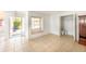 Bright dining room with tile floor and window seat at 6246 Green View Cir # 97, Sarasota, FL 34231