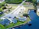 Aerial view of waterfront community and clubhouse at 6670 Harmony Rd, North Port, FL 34287