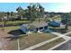 Single-Gathering home with driveway and landscaped yard at 6670 Harmony Rd, North Port, FL 34287
