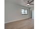 Light and airy bedroom with ceiling fan and wood-look flooring at 6670 Harmony Rd, North Port, FL 34287