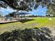 Shaded playground with play structures and equipment at 6700 Harmony Rd, North Port, FL 34287