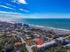 Aerial view showcasing a beach town location and proximity to the ocean at 702 Granada Ave # 7, Venice, FL 34285