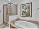 Spa-like bathroom with soaking tub and walk-in shower at 702 Granada Ave # 7, Venice, FL 34285
