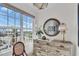 Bedroom with large windows and water view at 702 Granada Ave # 7, Venice, FL 34285