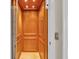 Elegant wooden elevator inside a luxury home at 702 Granada Ave # 7, Venice, FL 34285
