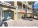 Unit with two-car garage and paver driveway at 702 Granada Ave # 7, Venice, FL 34285