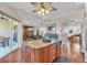 Island kitchen with granite countertops and access to the balcony at 702 Granada Ave # 7, Venice, FL 34285