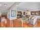 Bright and airy living room with hardwood floors, and comfortable seating at 702 Granada Ave # 7, Venice, FL 34285