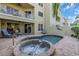 Private pool and spa with patio furniture, perfect for relaxing at 702 Granada Ave # 7, Venice, FL 34285