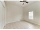 Bright bedroom with tile floors, double closets, and window with shutters at 7023 Chickasaw Bayou Rd, Bradenton, FL 34203