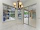 Bright dining area with pool view and sliding glass doors at 7023 Chickasaw Bayou Rd, Bradenton, FL 34203