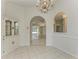 Bright dining room with built-in hutch and view of the living room at 7023 Chickasaw Bayou Rd, Bradenton, FL 34203