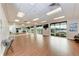 Bright and spacious fitness room with wood floors and mirrors at 7023 Chickasaw Bayou Rd, Bradenton, FL 34203