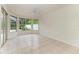Gathering room with tile floors, sliding doors and pool view at 7023 Chickasaw Bayou Rd, Bradenton, FL 34203