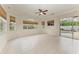 Gathering room with tile floor, ceiling fan and pool access at 7023 Chickasaw Bayou Rd, Bradenton, FL 34203