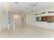 Large living room with views of the kitchen and entryway at 7023 Chickasaw Bayou Rd, Bradenton, FL 34203